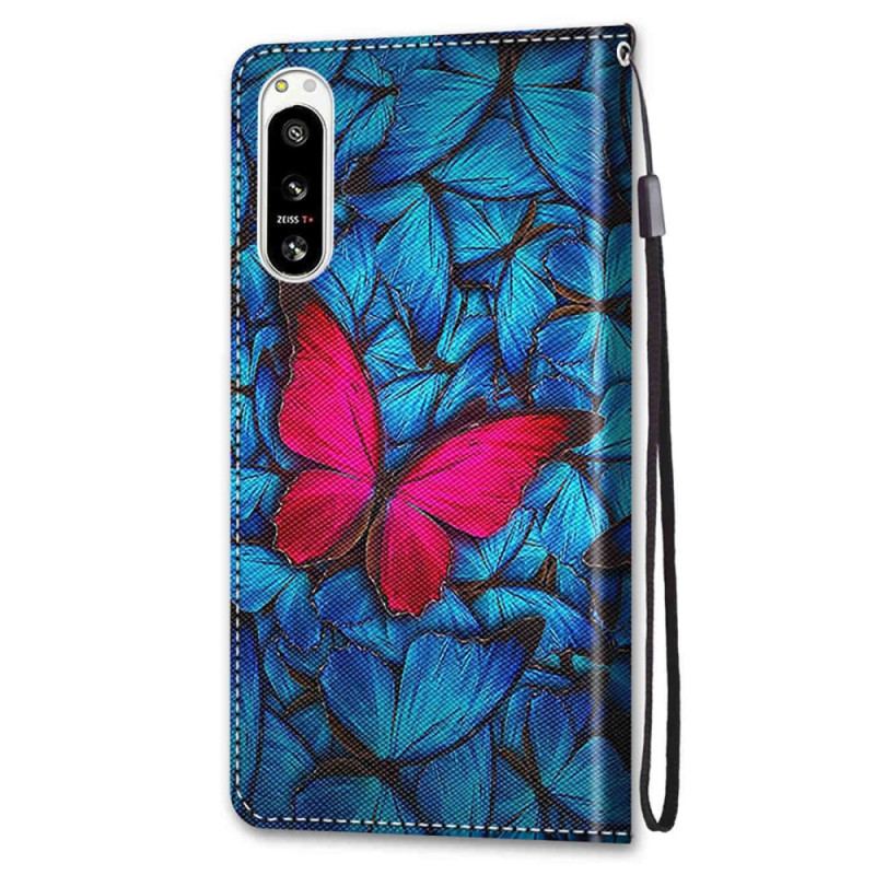 Capa De Couro Para Sony Xperia 5 IV Borboleta Vermelha Fundo Azul