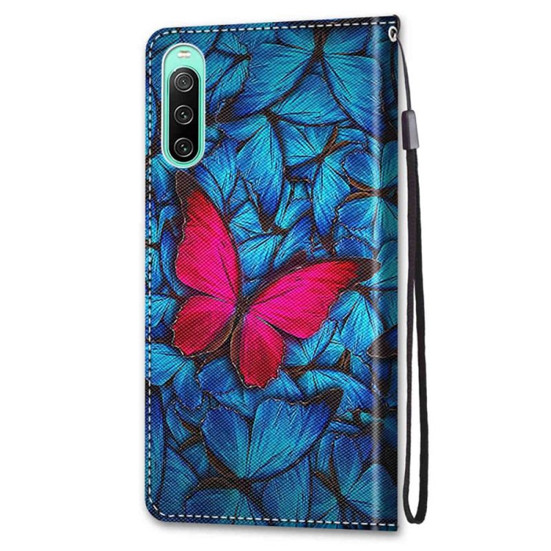 Capa Folio Para Sony Xperia 10 IV Borboleta Vermelha Fundo Azul